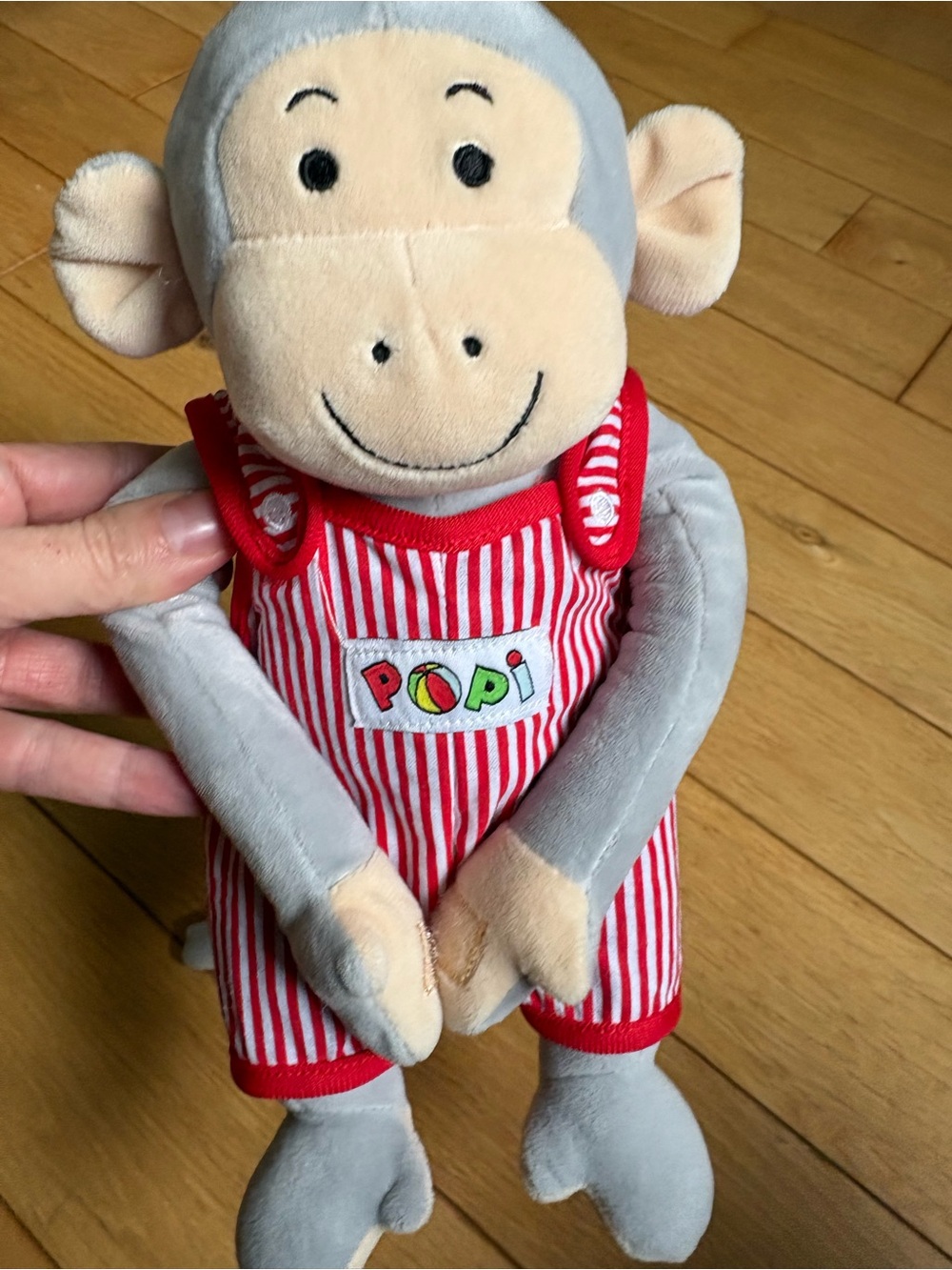 Popi Grey Plush Monkey in Red Striped Overalls